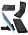 Picture of Universal Stand Ultra-Slim Mini Foldable Wireless portable Handheld Bluetooth Keyboard   for iPhone, iPad, Smart Phones